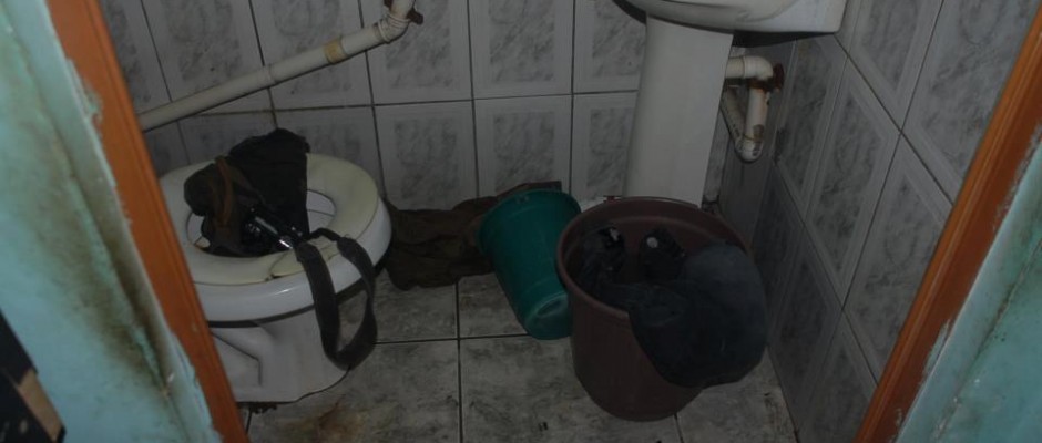 Bira's work equipment, a photographic camera, was found inside the toilet.