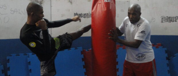 Martial arts teacher Zé Milton trains with Penca.