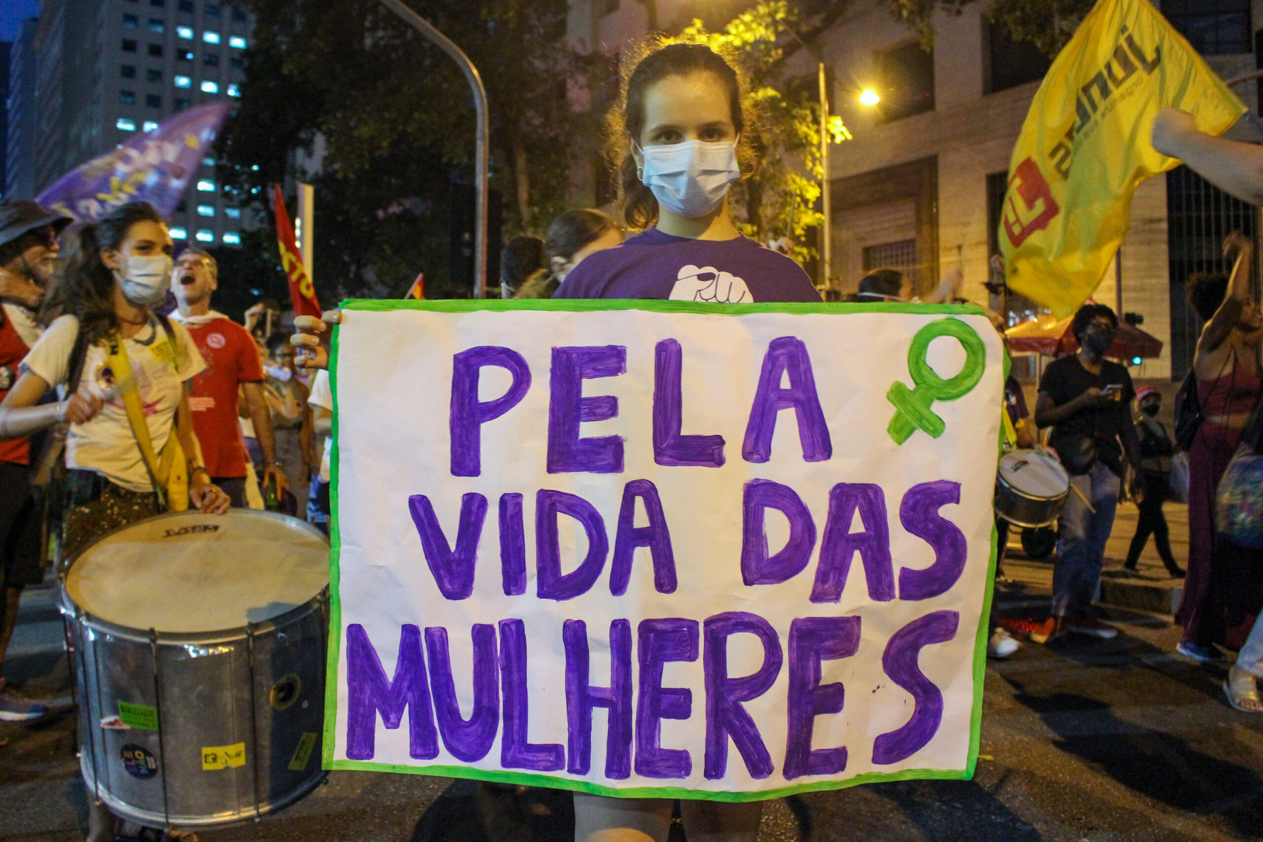 Violence against women was one of the themes raised by activists on signs and speeches. Photo: Jaqueline Suarez