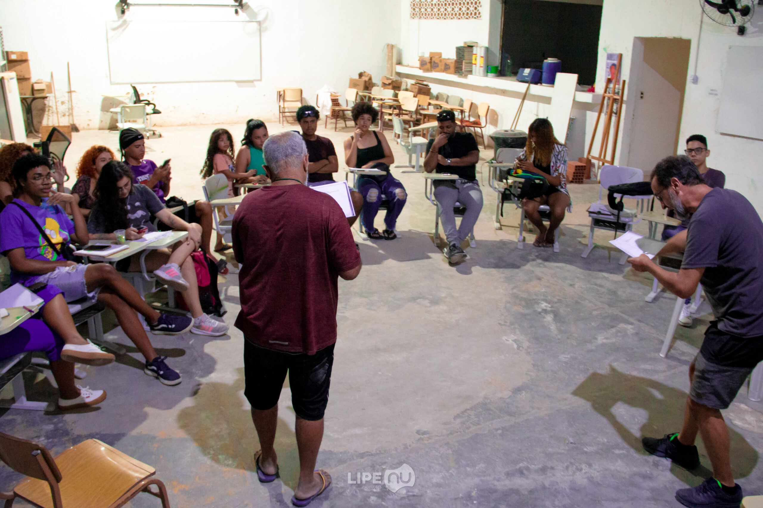Deley de Acari reciting and battling with poet and mentor Jair Dias at CineSarau Nzinga de Angola in the Acari favela in Rio's North Zone on June 24, 2023. Photo: Felipe Nunes