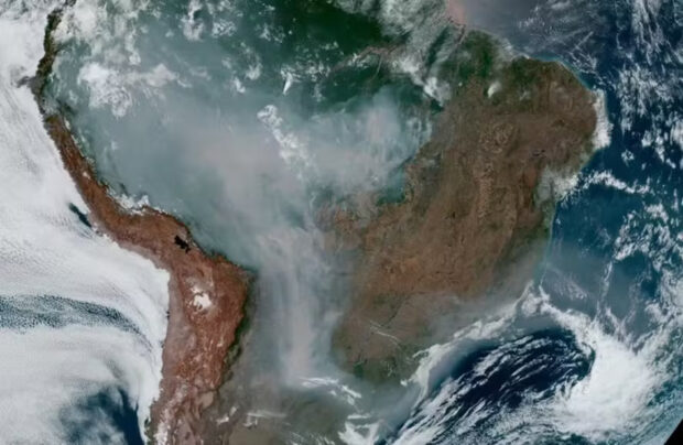 Satellite image shows smoke from wildfires covering most of South America. Photo: National Oceanic and Atmospheric Administration (NOAA)/National Aeronautics and Space Administration (NASA).