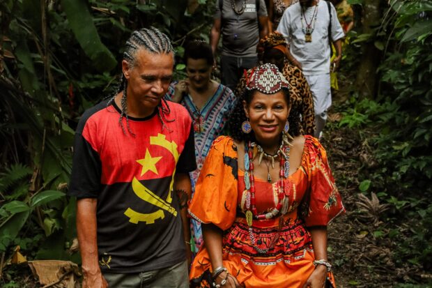 Quilombola leader Adilson Almeida and Her Royal Majesty Queen Diambi during a walk through the Camorim Quilombo. Photo: Rhuan Gonçalves