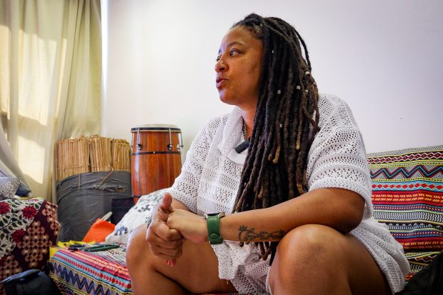 Suellen Tavares during an interview with RioOnWatch at Casa do Jongo da Serrinha. Photo: Rhuan Gonçalves Suellen Tavares during her interview with RioOnWatch at Casa do Jongo da Serrinha. Photo: Rhuan Gonçalves